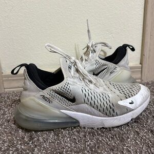 white and black nike 270